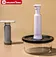 Glass container with silicone sleeve